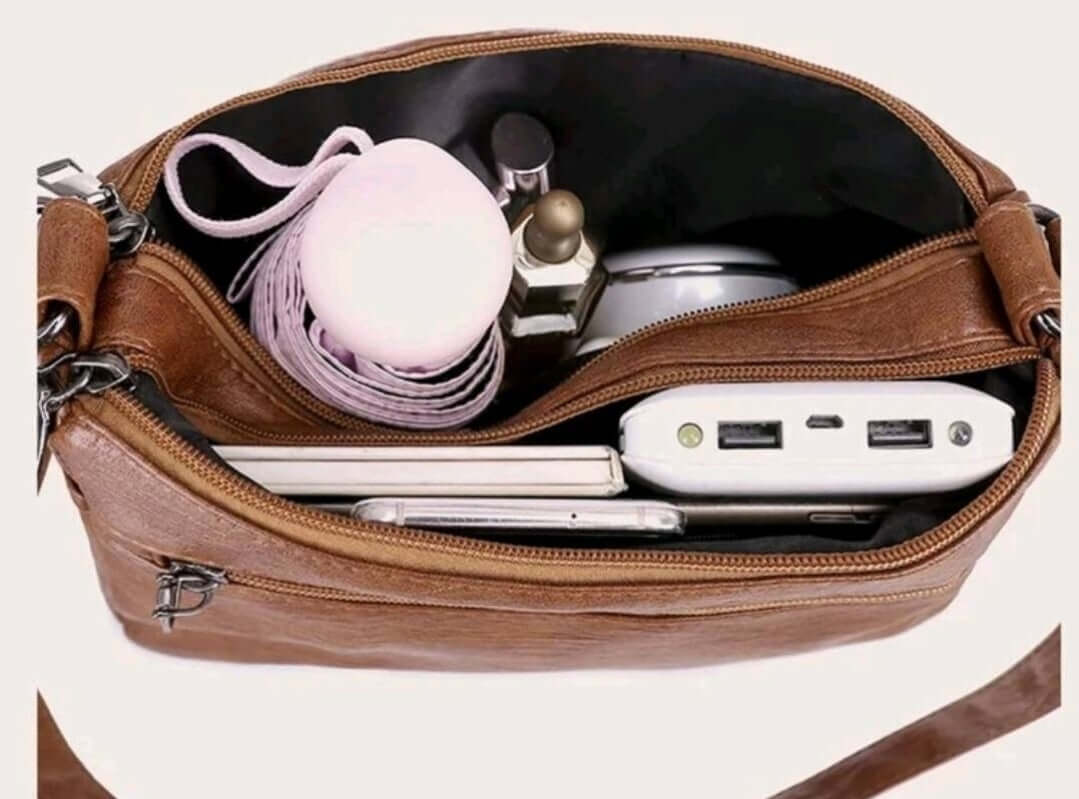 soft leather tan multi pocket zipped shoulder bag