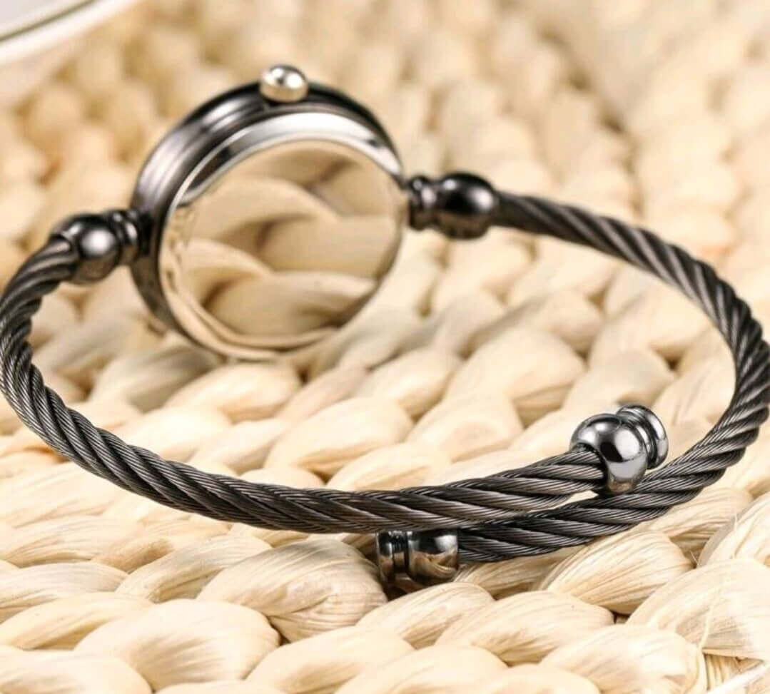 Ladies Watch - round twisted black Quartz minimalist