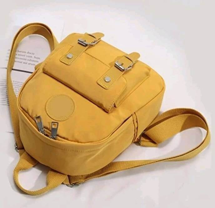 quirky yellow nylon backpack