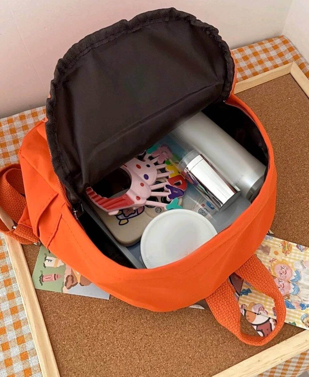quirky bright orange nylon backpack