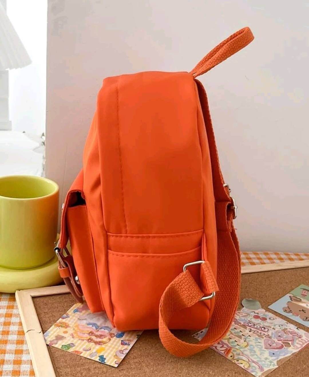 quirky bright orange nylon backpack