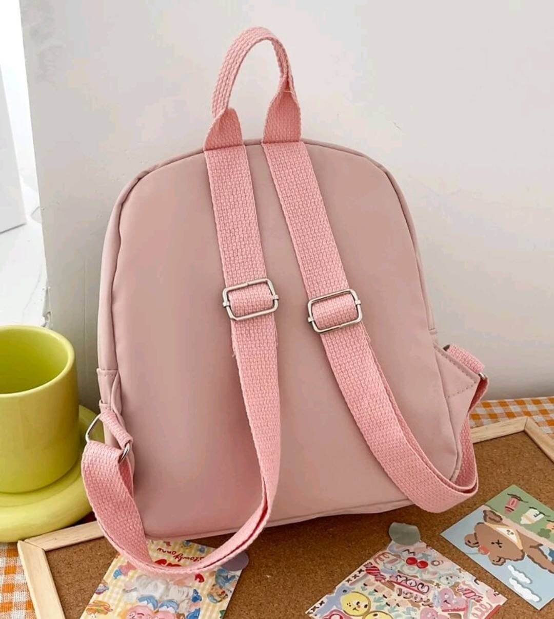 quirky light pink nylon backpack