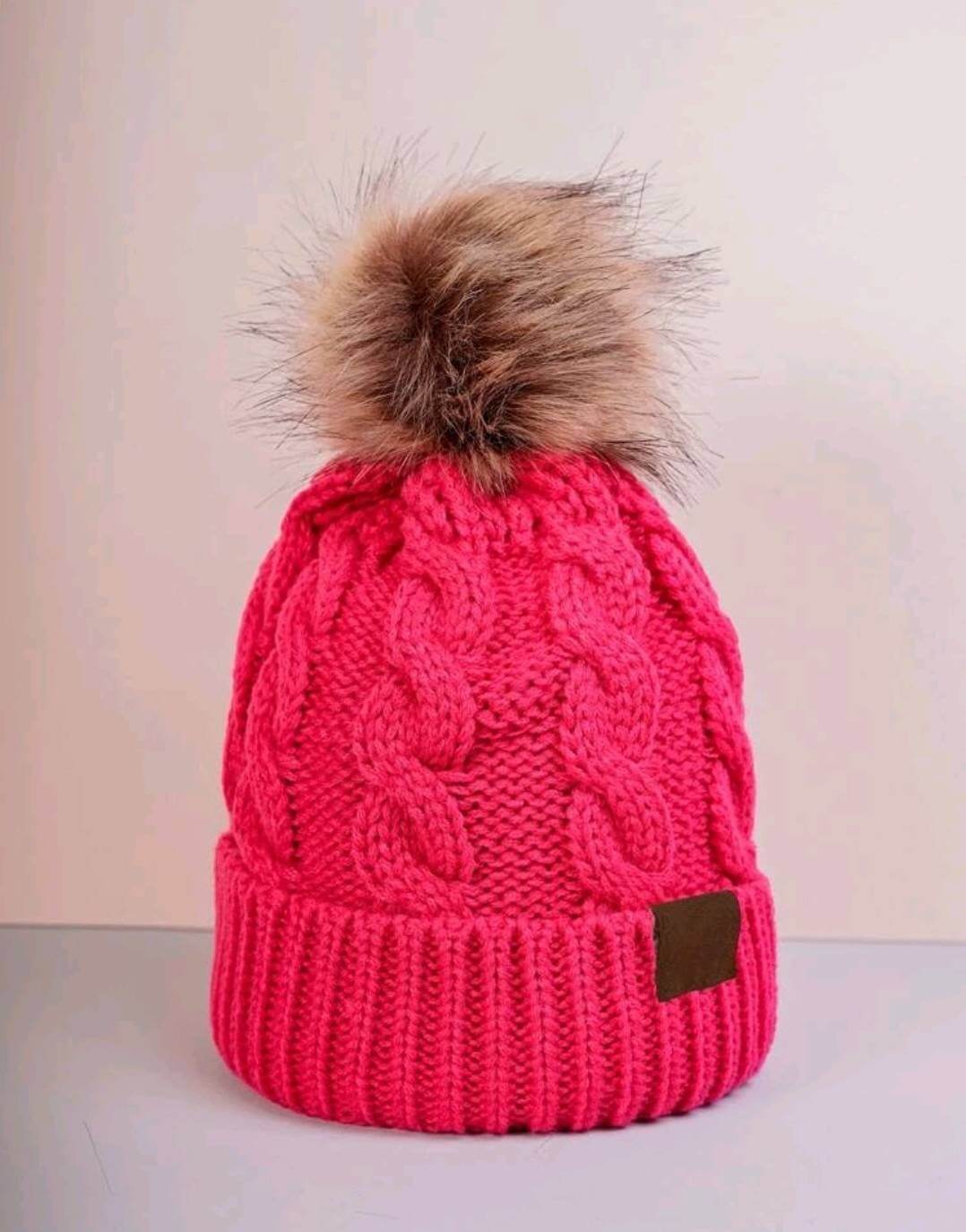 ladies bright pink pompom beanie