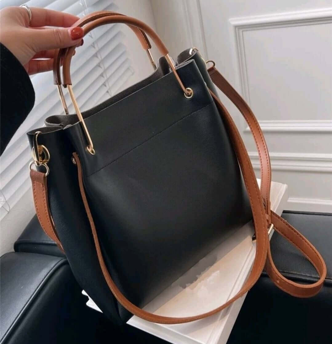 two tone black leather brown handle handbag shoulder bucket back