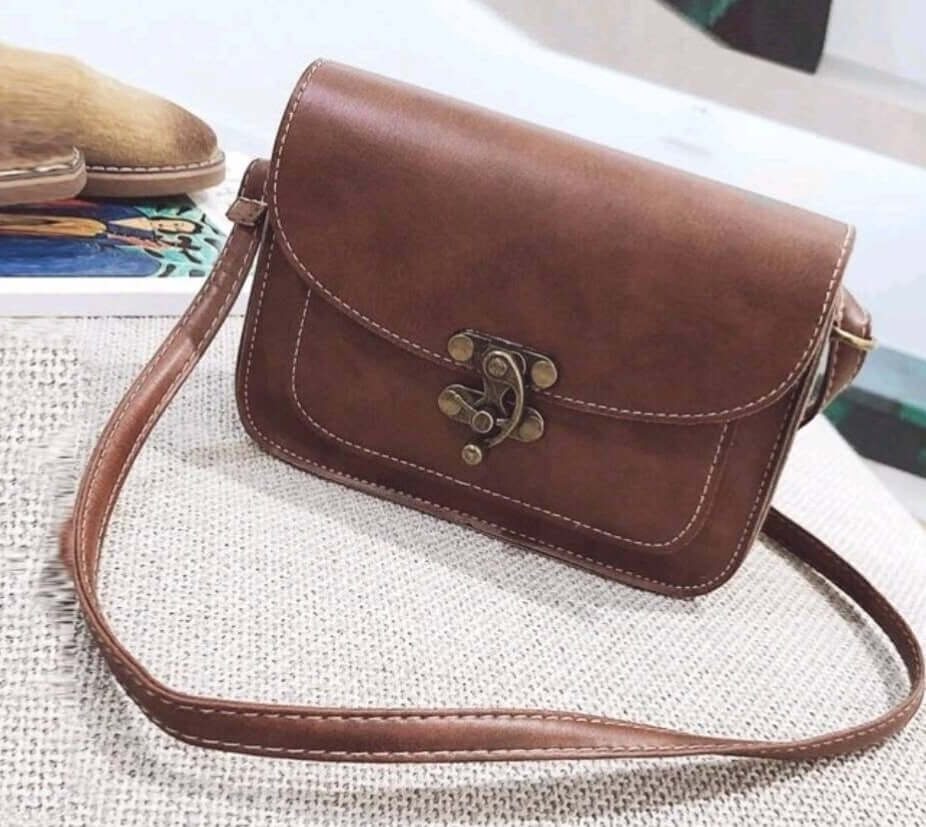 dark brown quirky lock leather shoulder bag 