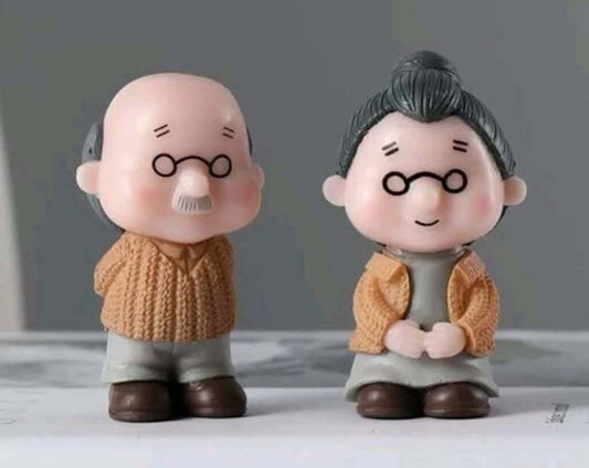 cute older couple resin cake topper