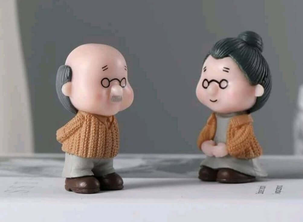 cute older couple resin cake topper