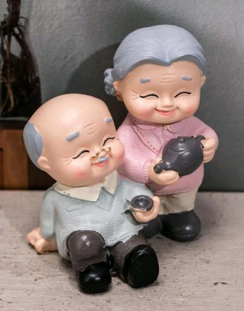 cute older couple resin cake topper
