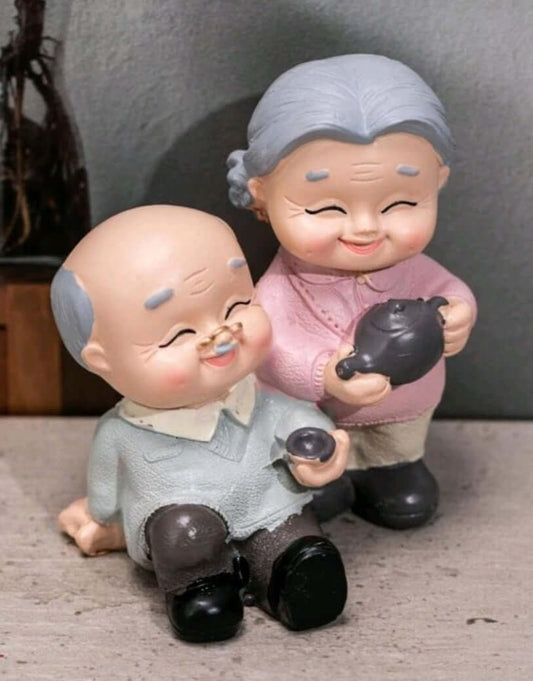 cute older couple resin cake topper