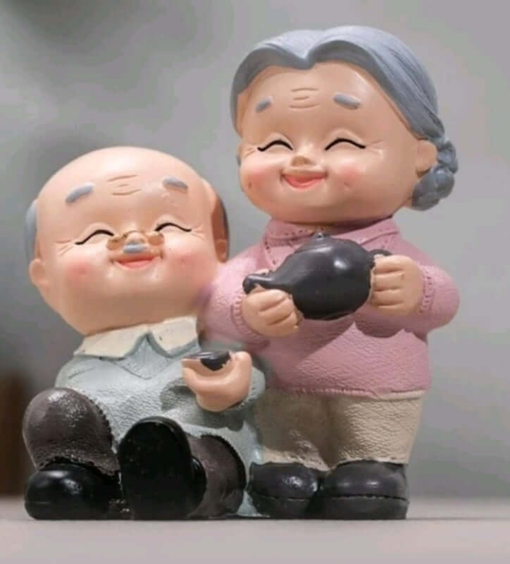 cute older couple resin cake topper