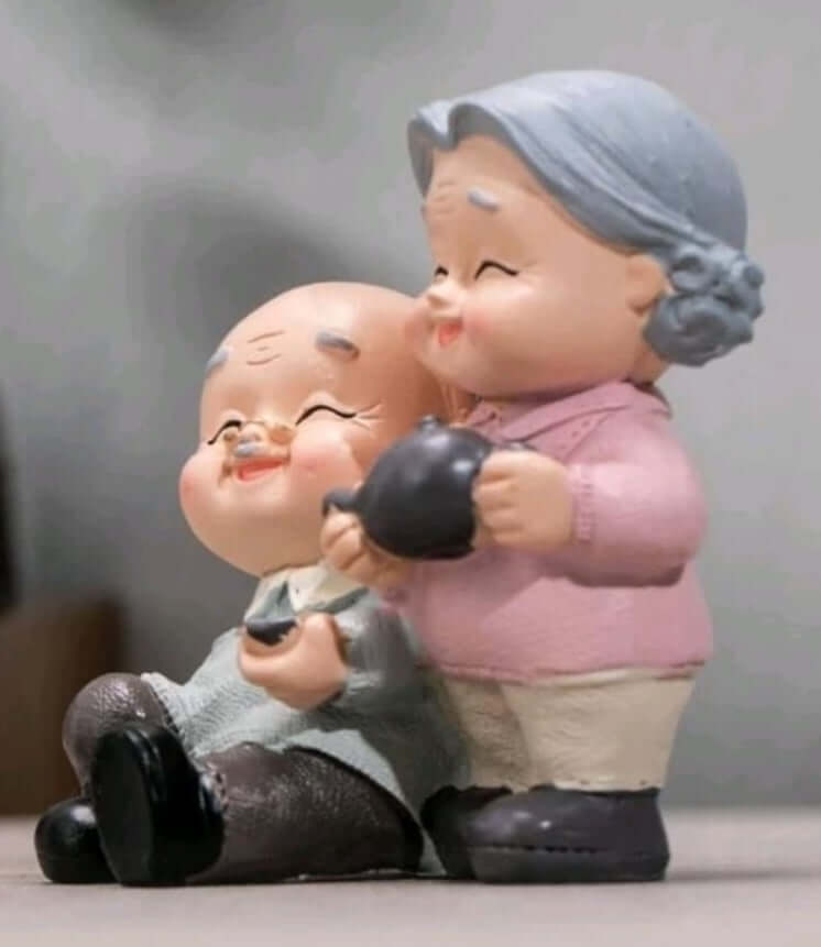 cute older couple resin cake topper