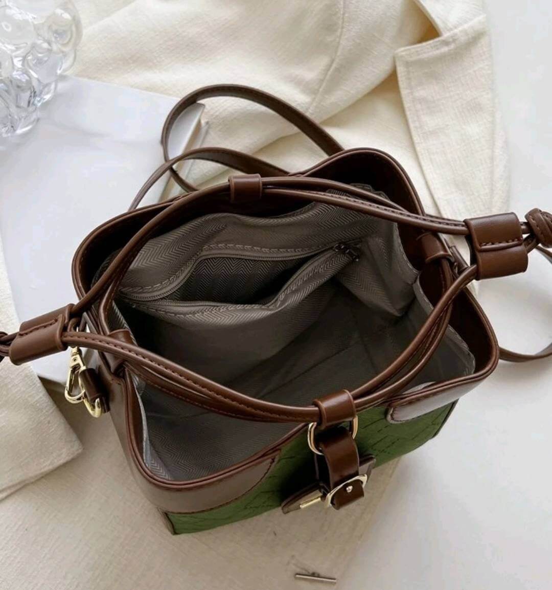 two tone green fabric brown leather tie pull bucket bag 