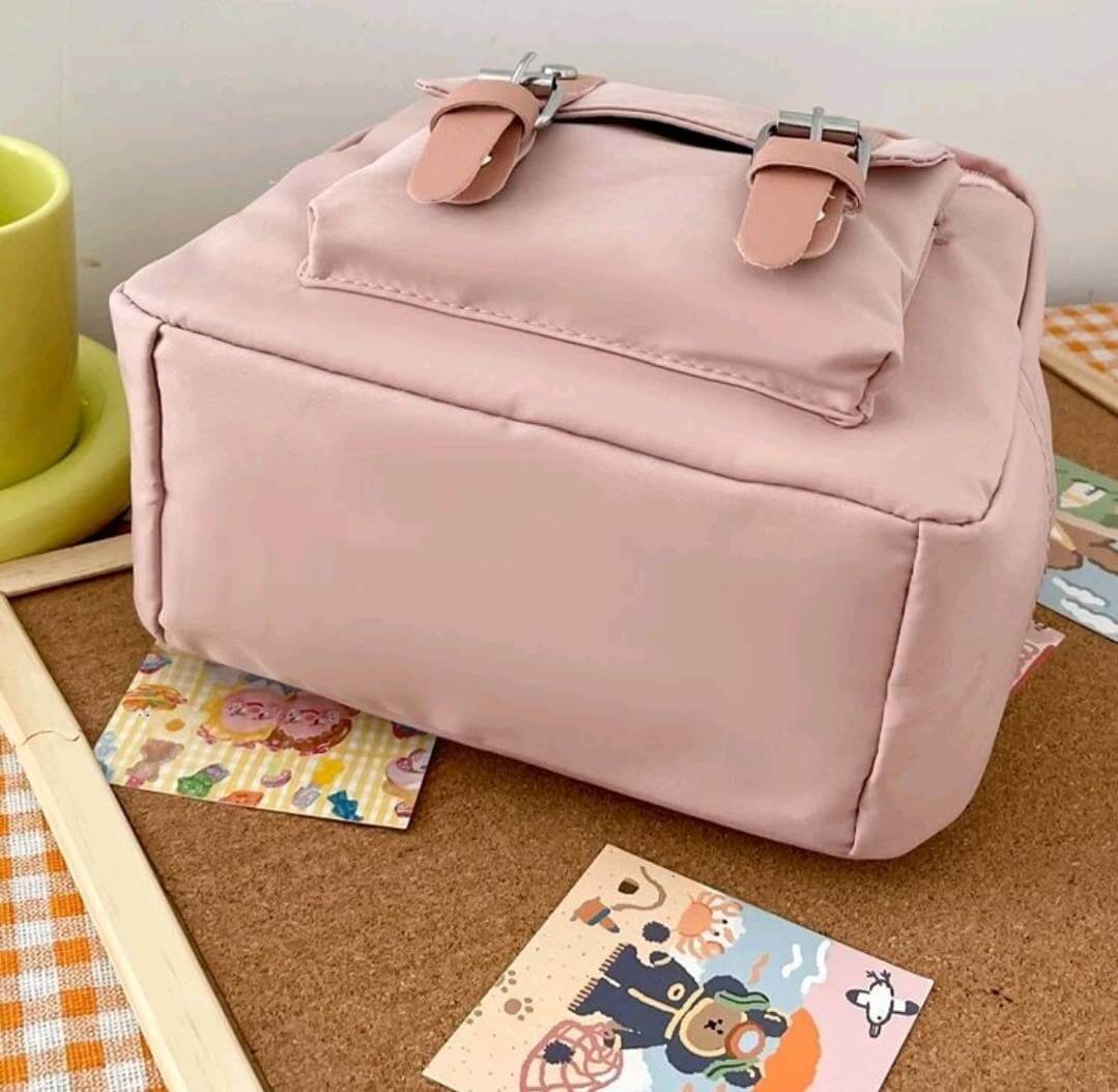 quirky light pink nylon backpack 