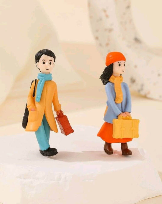 cute travelling couple resin cake topper