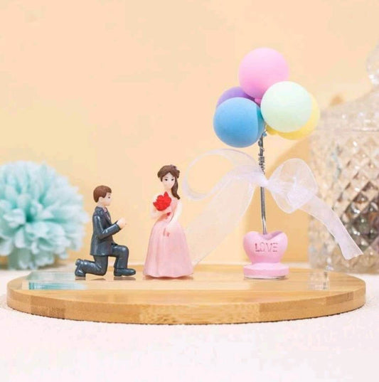 engaged couple balloons resin cake topper