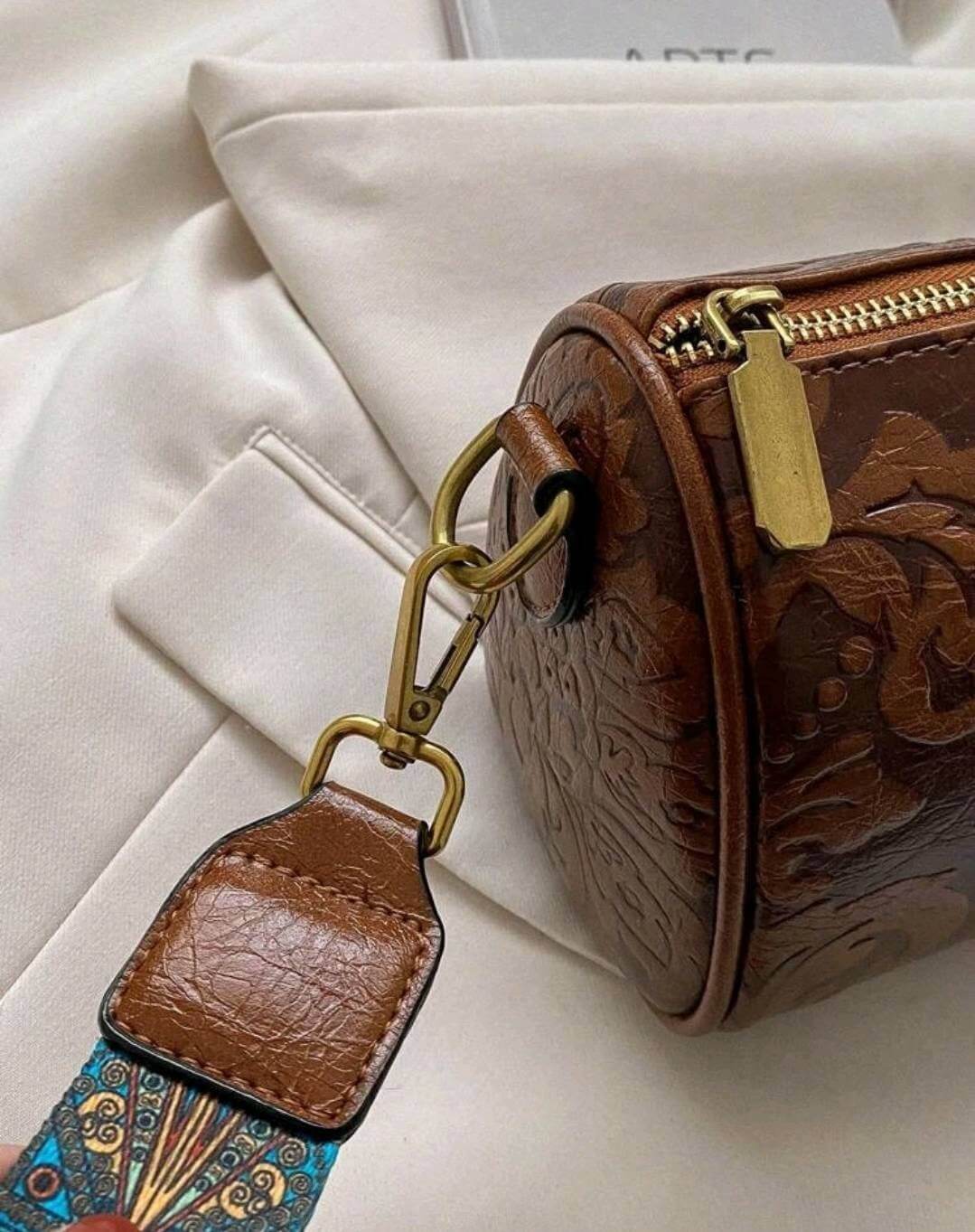 quirky luxury embossed leather brown shoulder bag 