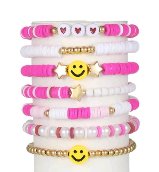 girls set of 8 pink bracelets